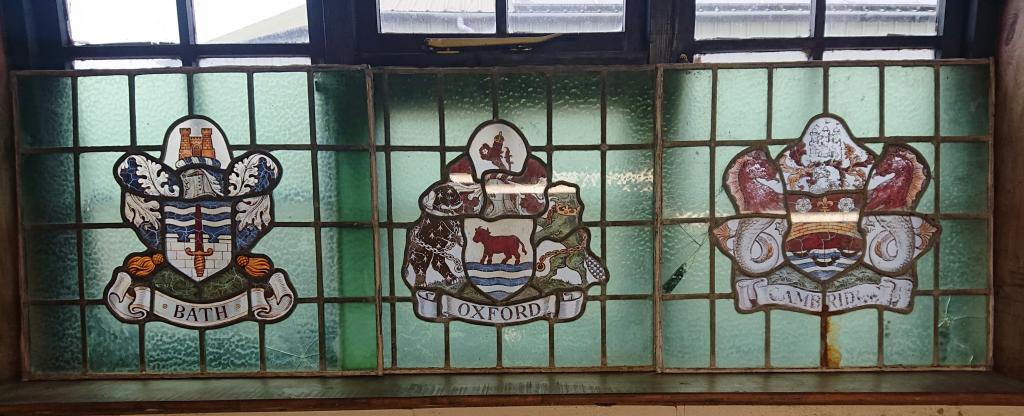 <p>Selection of Hand Painted Murials with City names mounted on leaded glass, reclaimed from a Pub in London.</p>